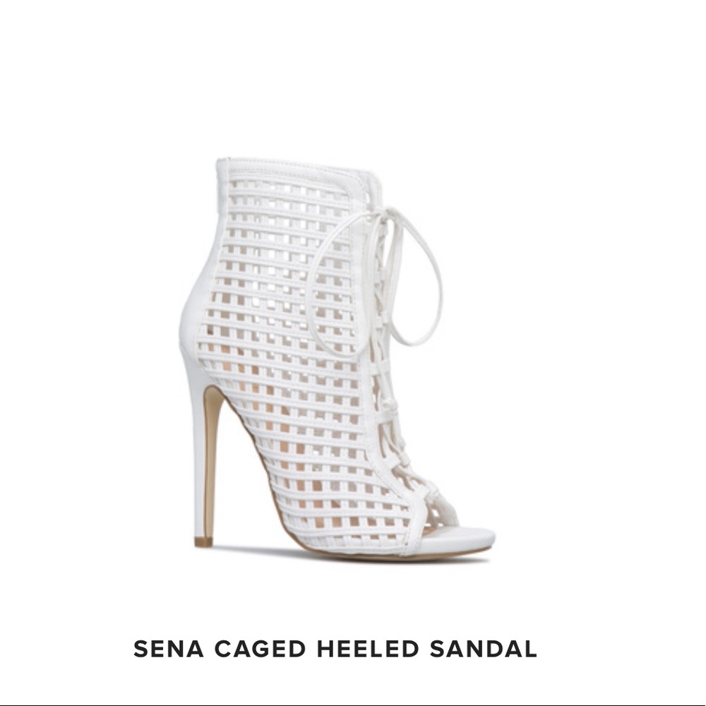 Meet Sena the white caged heeled sandal size 6 by shoe dazzle.